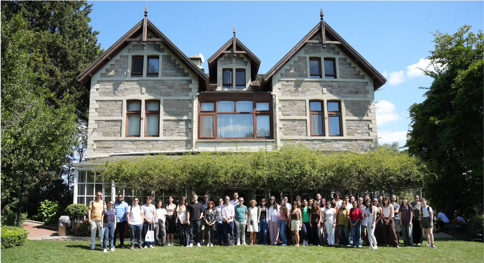 Group photo of Blended Intensive Programme participants, lecturers, and organizing team gathered in front of a building on the Boğaziçi University South campus.